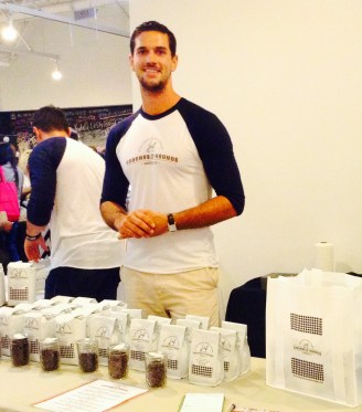 Grounds & Hounds founder, Jordan Karcher, brewing beans to help hounds in need at BeautyCon LA 2014 (photo credit: Alexa Wyman)