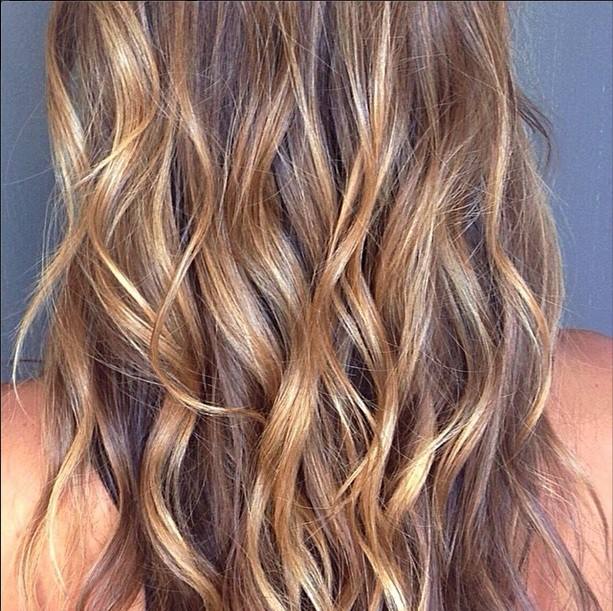 Dark golden blond highlights by Evelyn Arrieta at Jonathan and George.