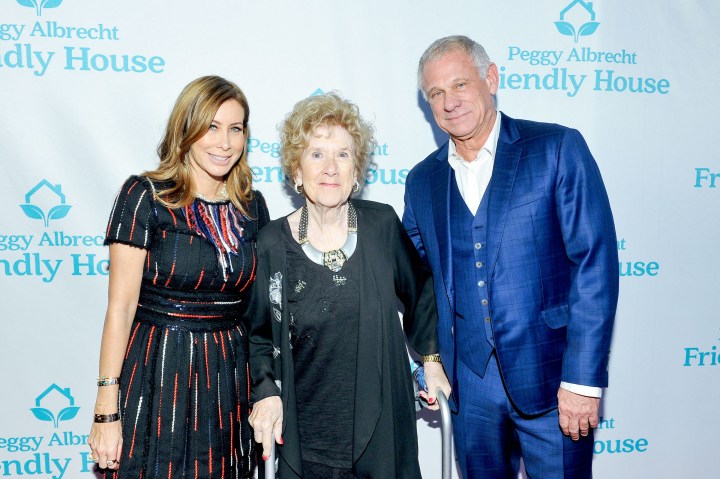Co-chairs Sydney Holland (left) and Howard Samuels (right) with Executive Director of Friendly House Peggy Albrecht (center)